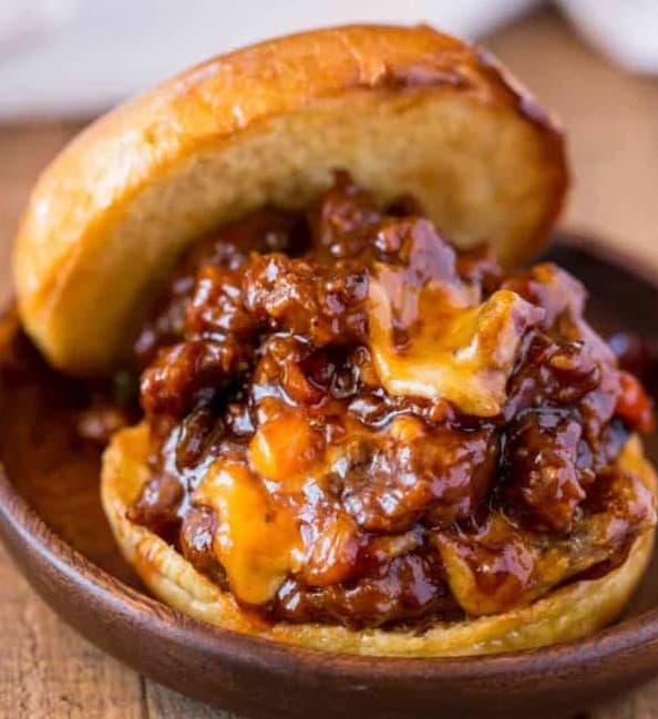 Close up of BBQ Sausage Sloppy Joes on a plate.