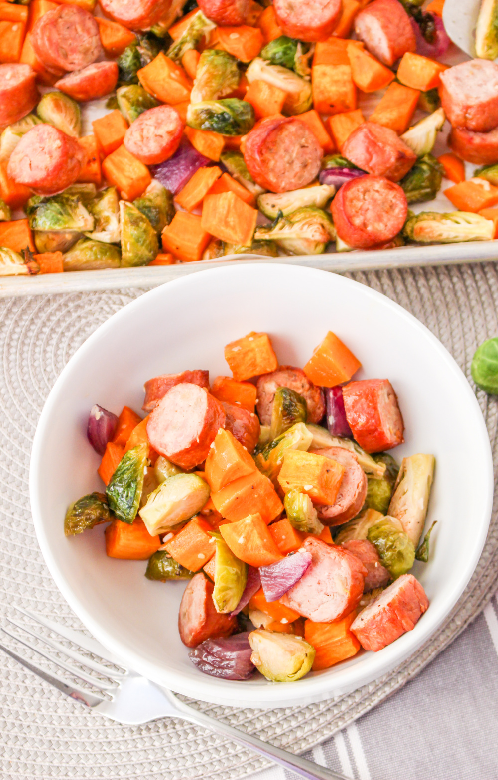 Chicken Apple Sausage Sheet Pan Dinner in a white bowl.