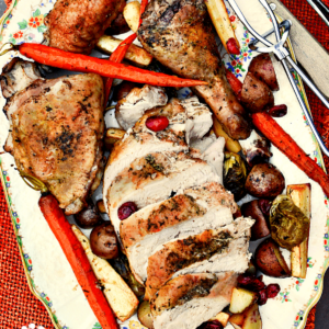 Sliced turkey and vegetables on a platter with text overlay reading.