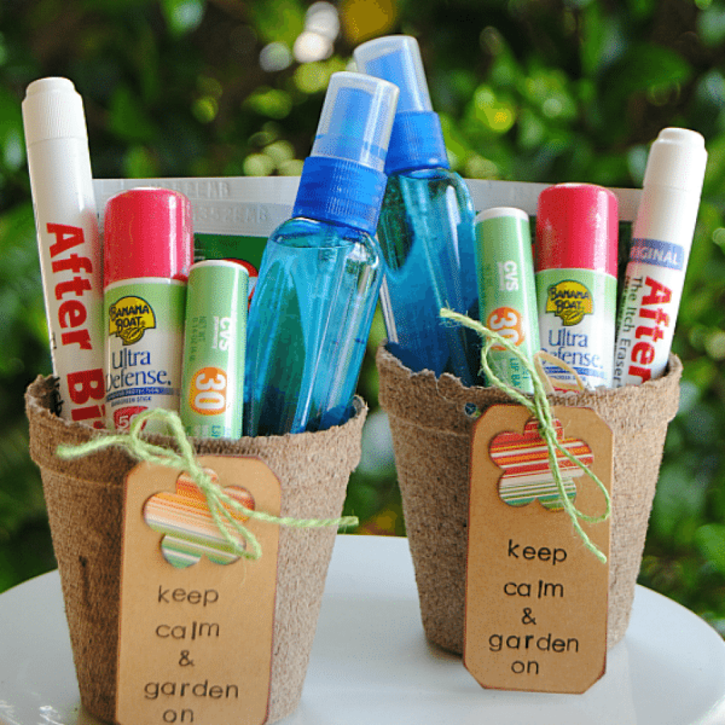Seed pots filled with bug spray, sunscreen and other items.