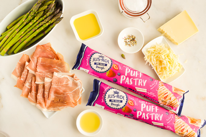 Ingredients for making puff pastry prosciutto and asparagus puff pastry bundles.