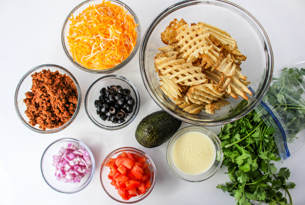 Waffle Fry Nacho Ingredients on a countertop.