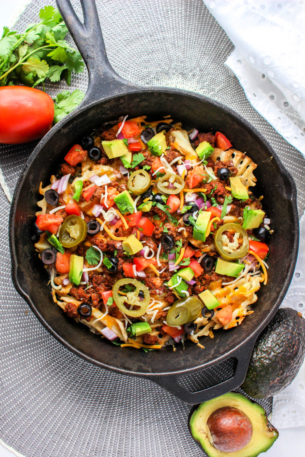 Waffle Fry Nachos in cast iron skillet