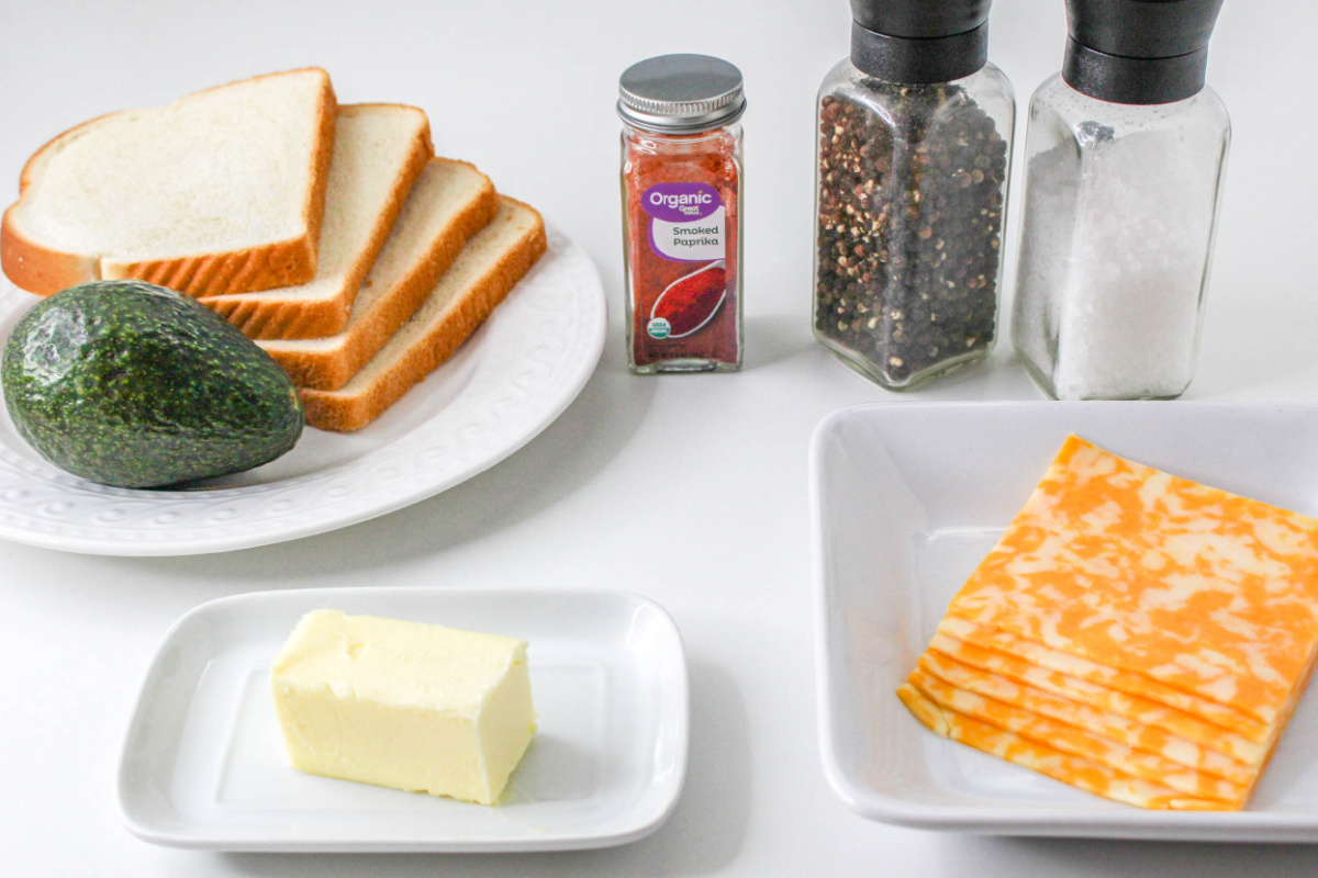 Avocado Grilled Cheese Ingredients including butter, bread, and seasonings.