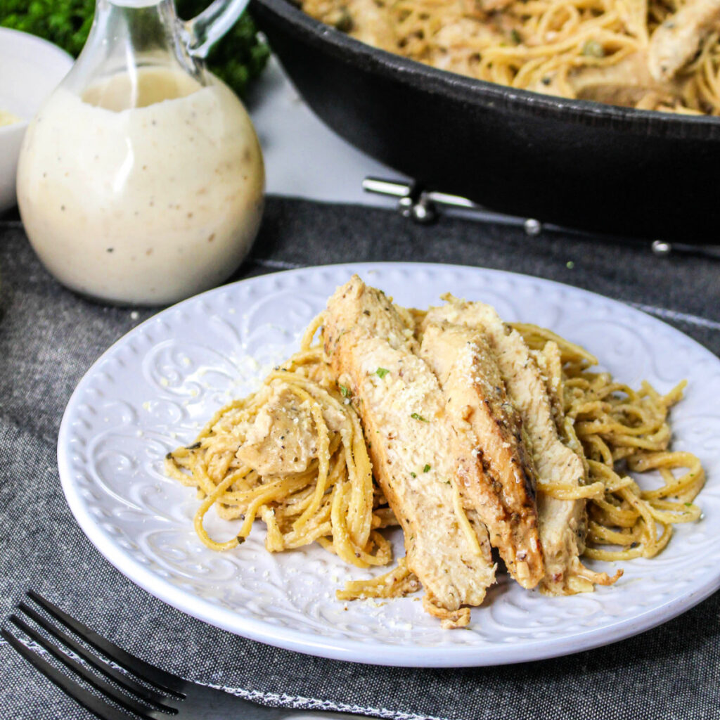 Chicken Caesar Pasta on a white plate.