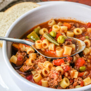 Easy Busy Day Soup close up in a bowl with a spoon.