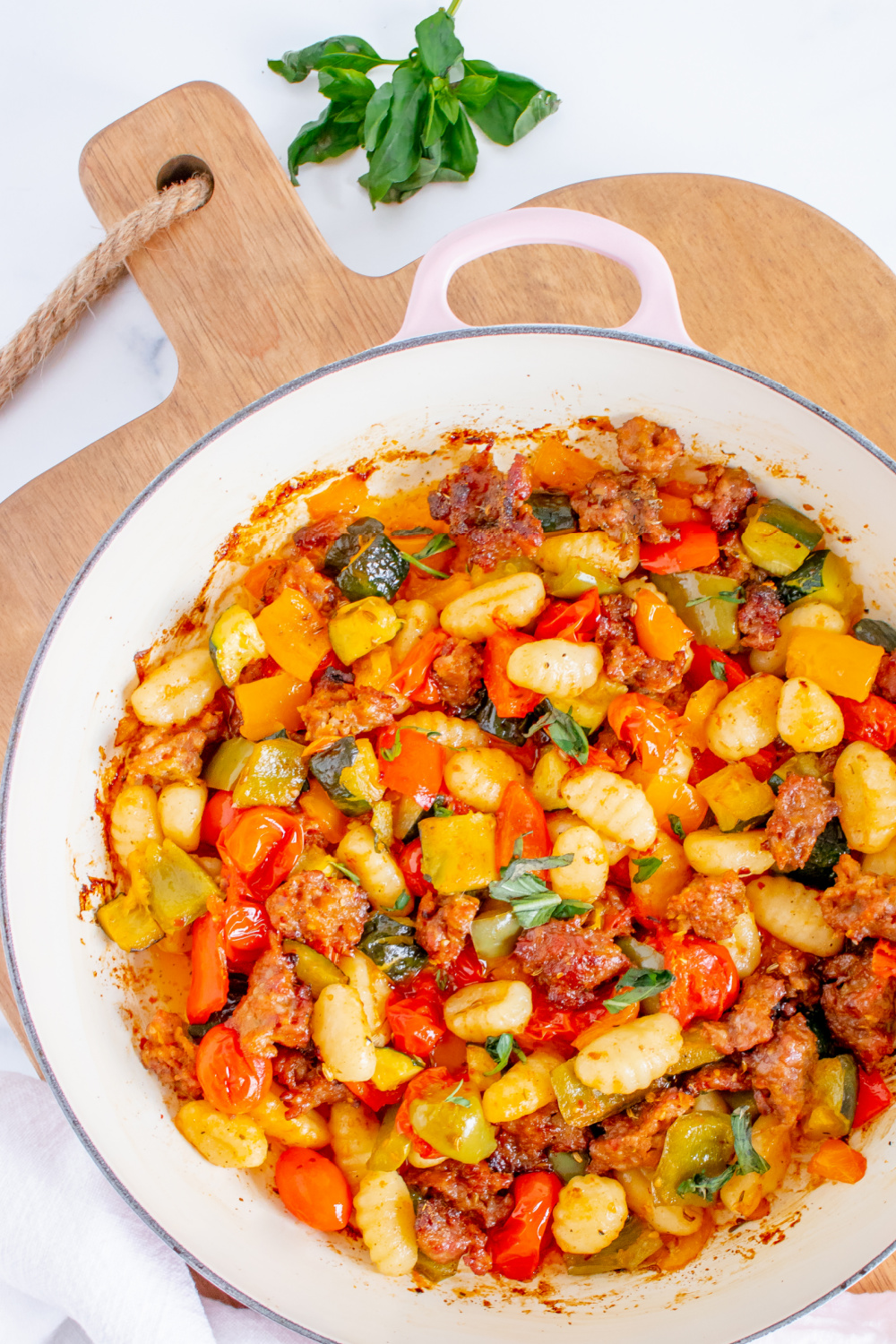Italian Sausage Gnocchi Bake in a white baking dish.