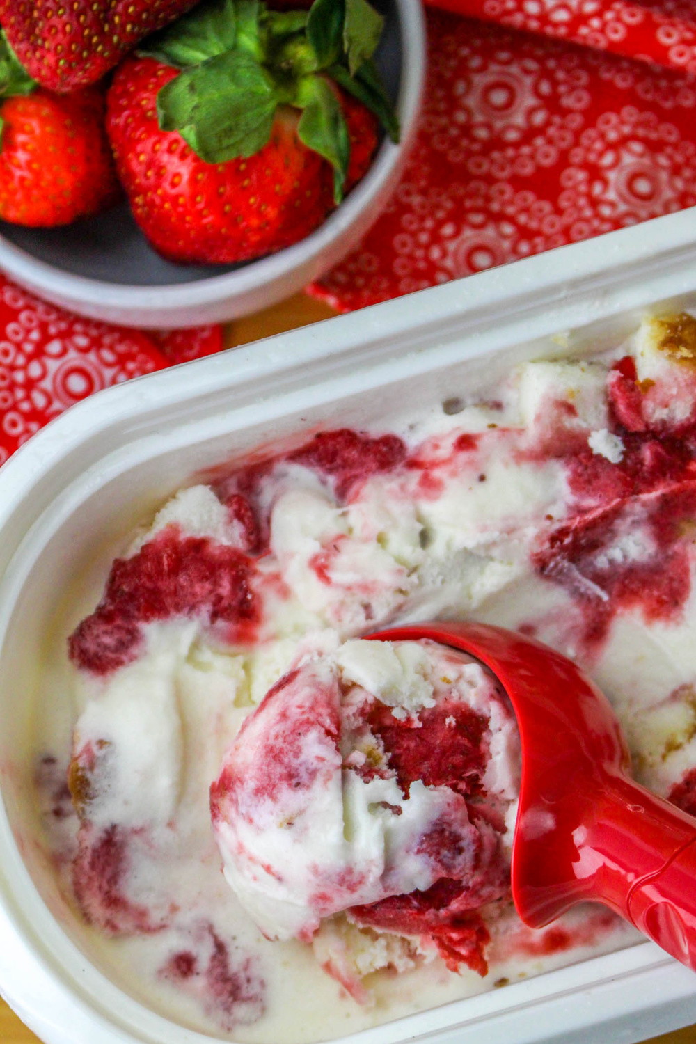 Close up of a scoop of Strawberry Shortcake Ice Cream.