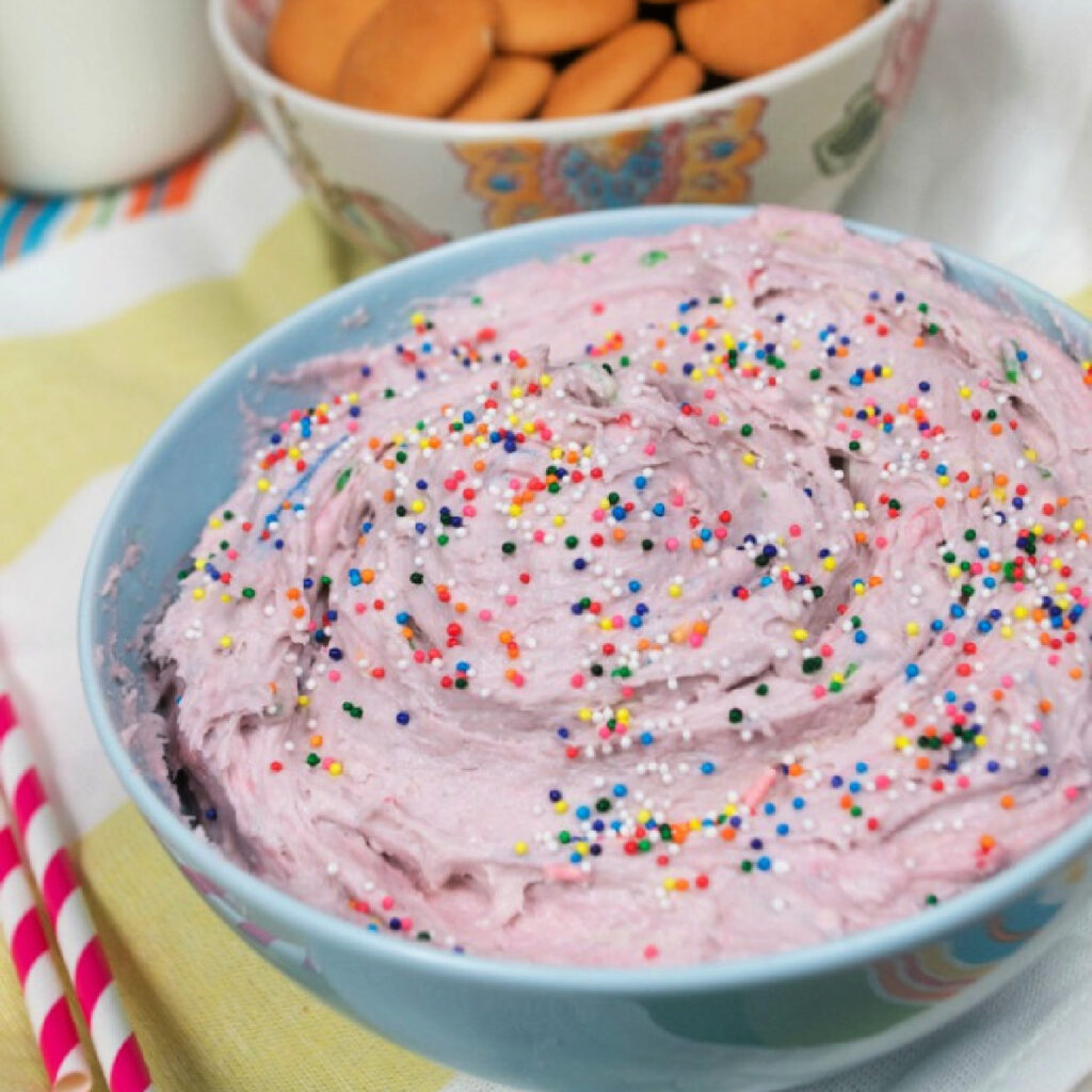 Bowl of Cake Batter Dip with sprinkles.