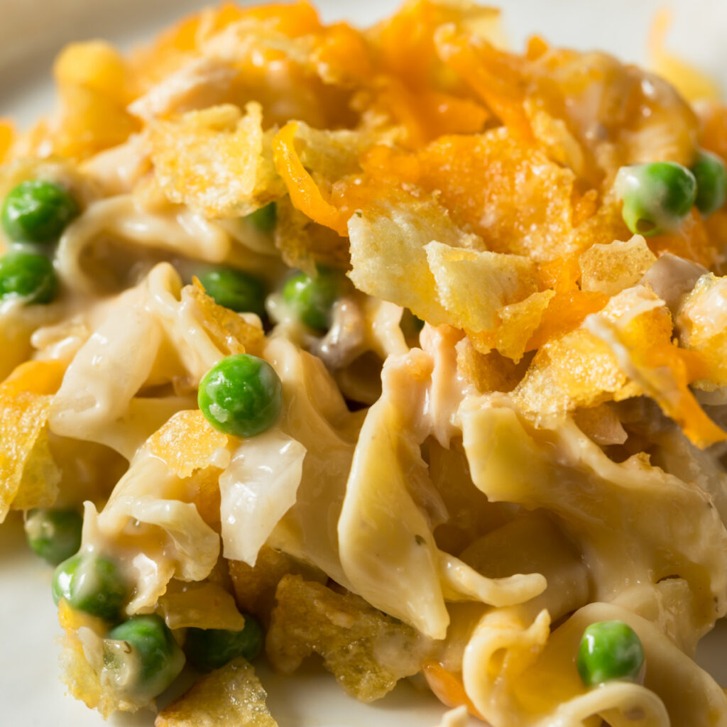 Close up of Classic Tuna Noodle Casserole with peas.