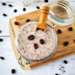 Close up of DIY Coffee Sugar Scrub in a jar.