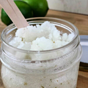 Close up of Lime Coconut Sugar Scrub in a jar.