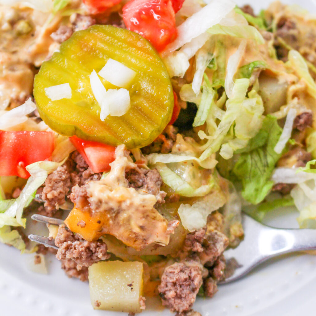 Big Mac Casserole on a plate with a fork.