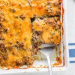 Close up of Hamburger and Potato Casserole in a white baking dish,