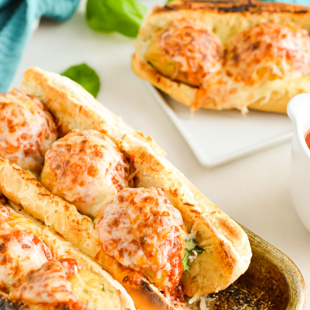 Close up of Chicken Meatball Subs on a tray.