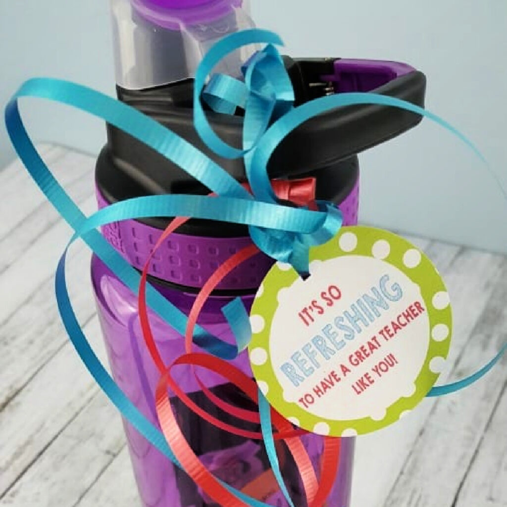 Water bottle with gift tag and curling ribbon.