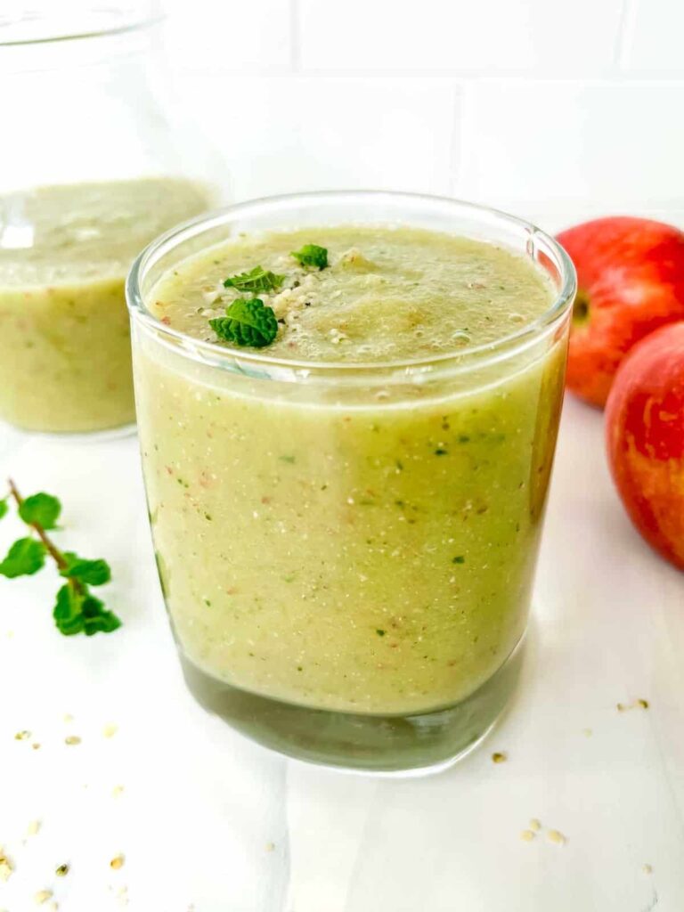 Apple cucumber smoothie in a glass.