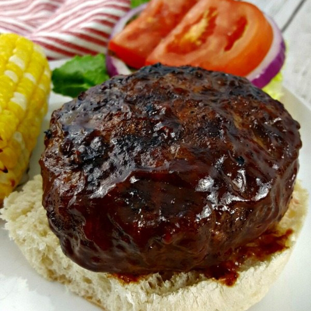 Close up of a BBQ Bacon Jack Stuffed Burger.
