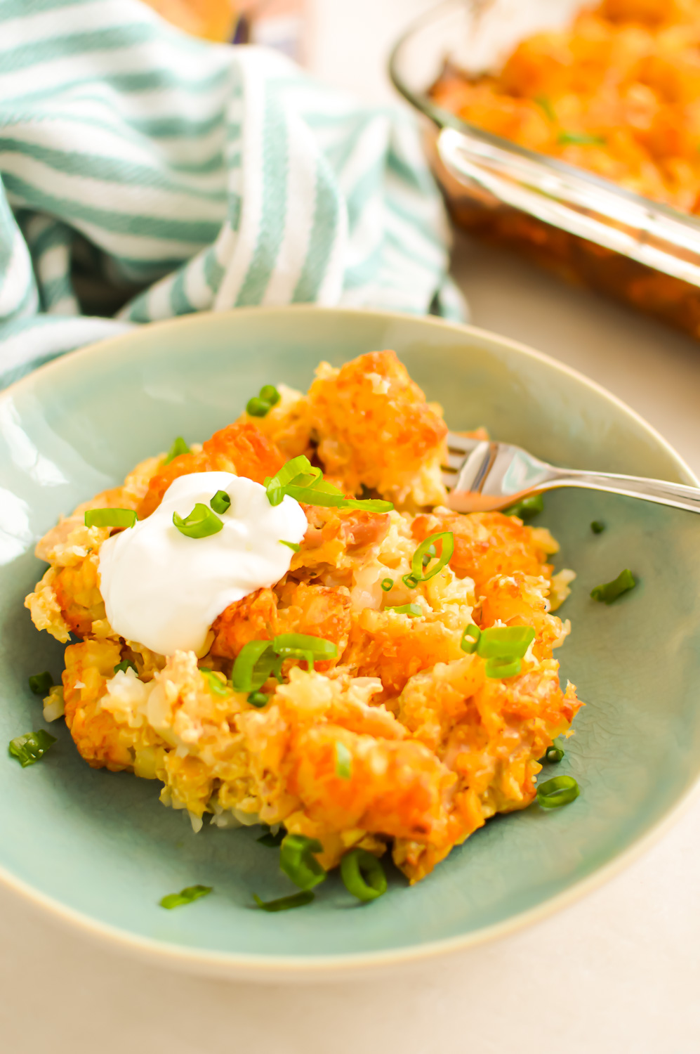 Tater Tot Casserole with Buffalo Chicken in a bowl.