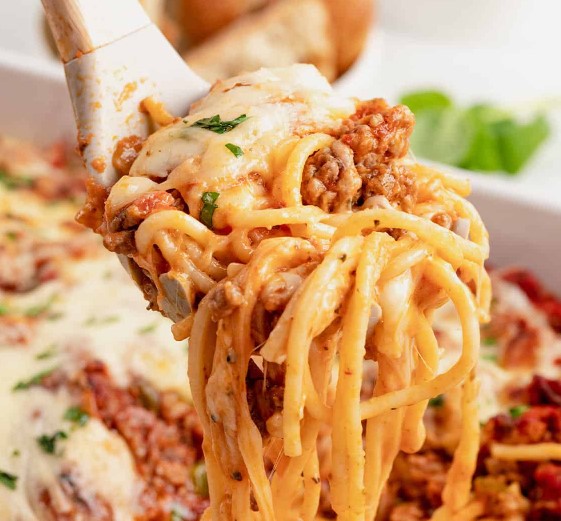 Spoonful of Million Dollar Spaghetti Alfredo.