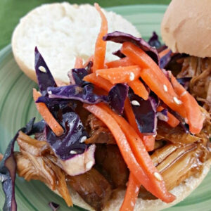 Close up of Slow Cooker Pulled Pork Sliders with Asian Purple Cabbage slow.