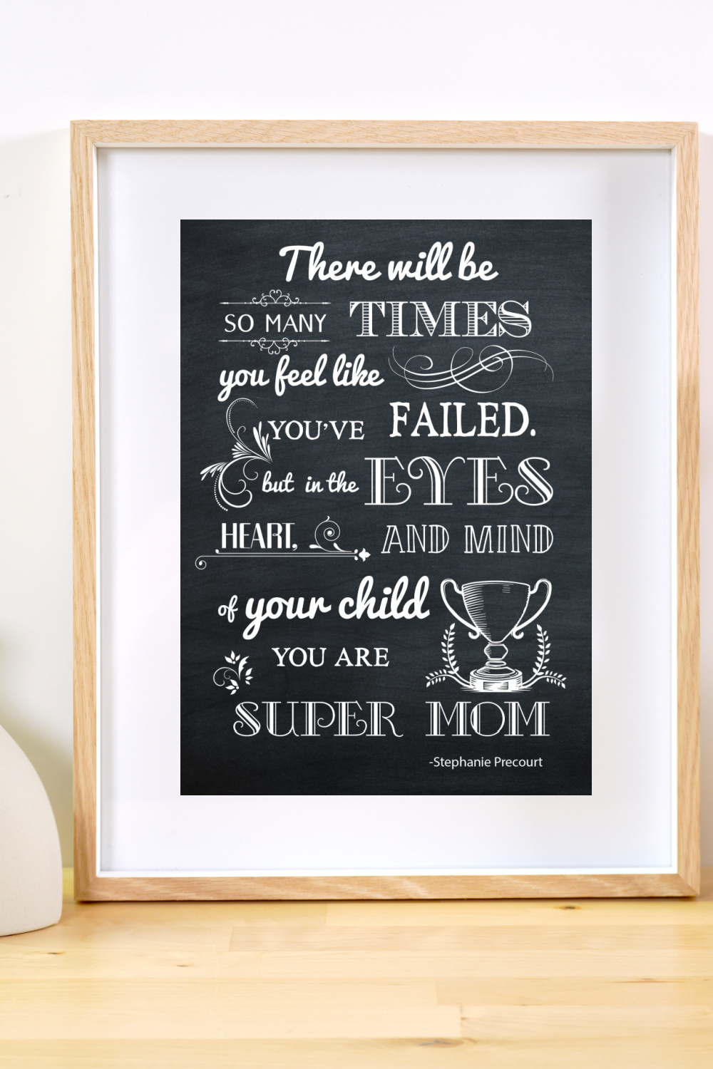 Super Mom Framed Printable on a shelf.