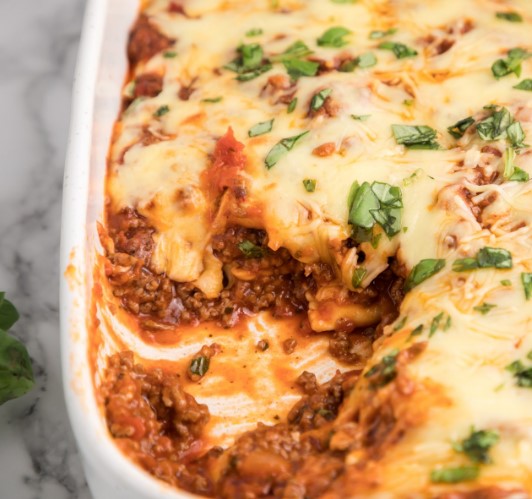 Ravioli Casserole in a white casserole dish.