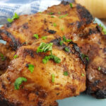 Close up of Chipotle Marinated Chicken garnished with parsley.