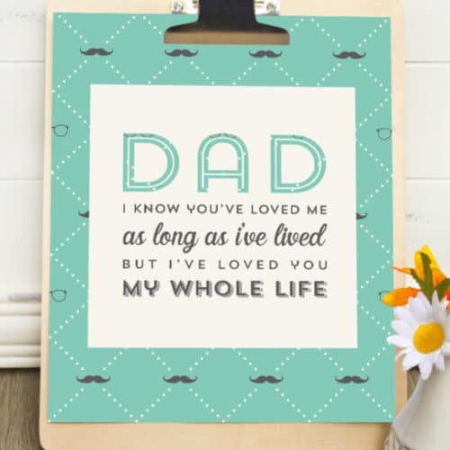 Fathers Day Printable on a clip board.