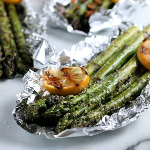 Grilled Asparagus in foil with a grilled lemon.