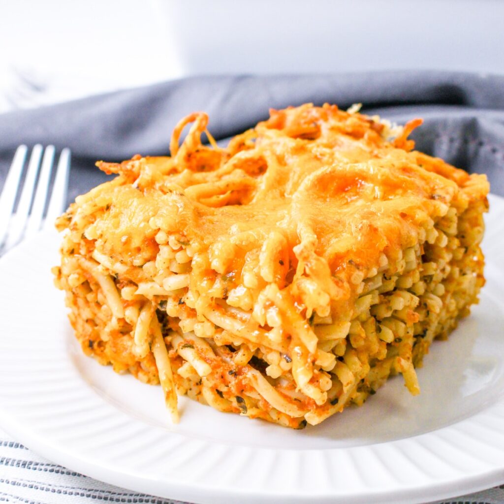 Close up of Leftover Spaghetti and Cheese on a plate.