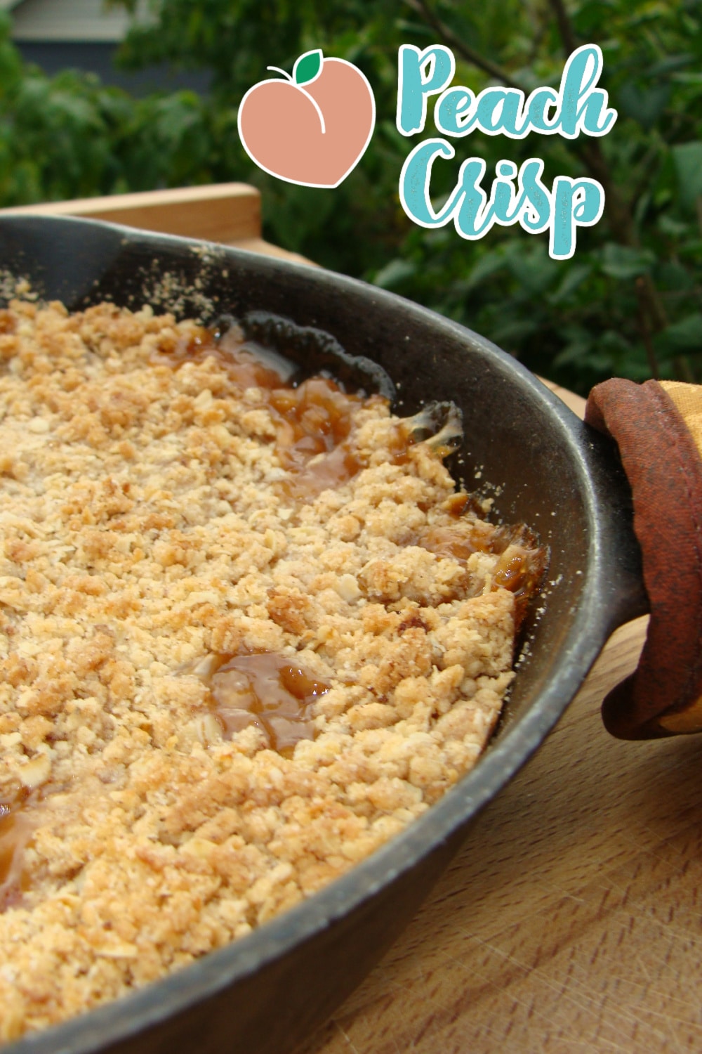 Peach Crisp is a cast iron skillet with text overlay.