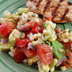 Close up of Corn Tomato Avocado Salsa on a plate.