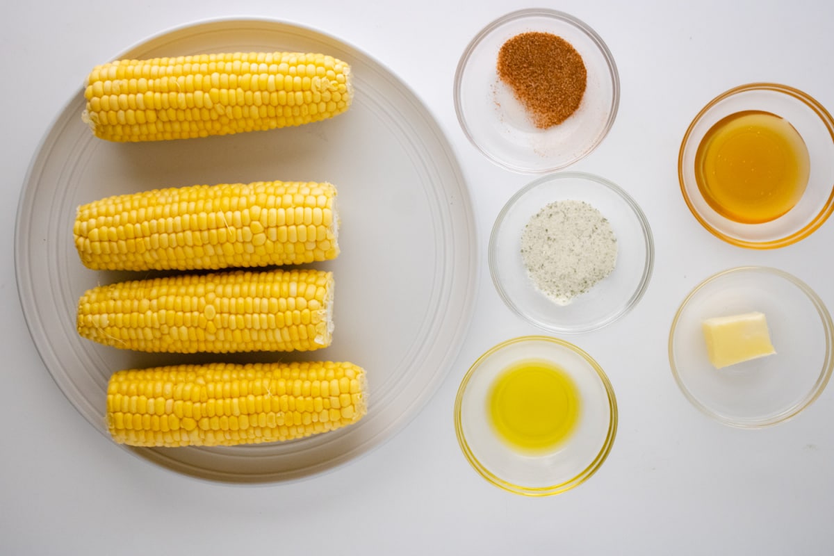 Air Fryer Corn on the Cobb ingredients on a countertop.