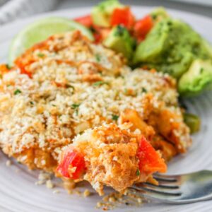 Close up of a fork with Chorizo and Potato Casserole.