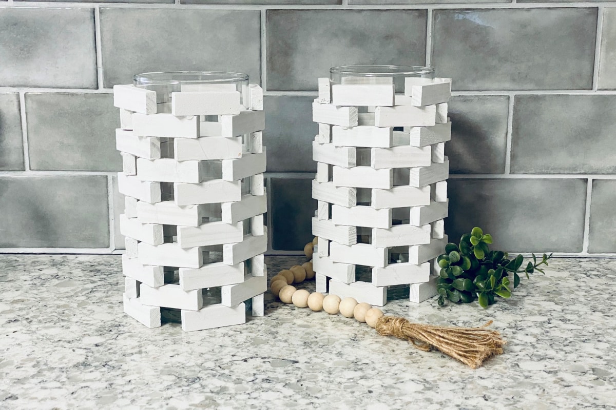 DIY Dollar Tree Candle Holders on a kitchen counter.