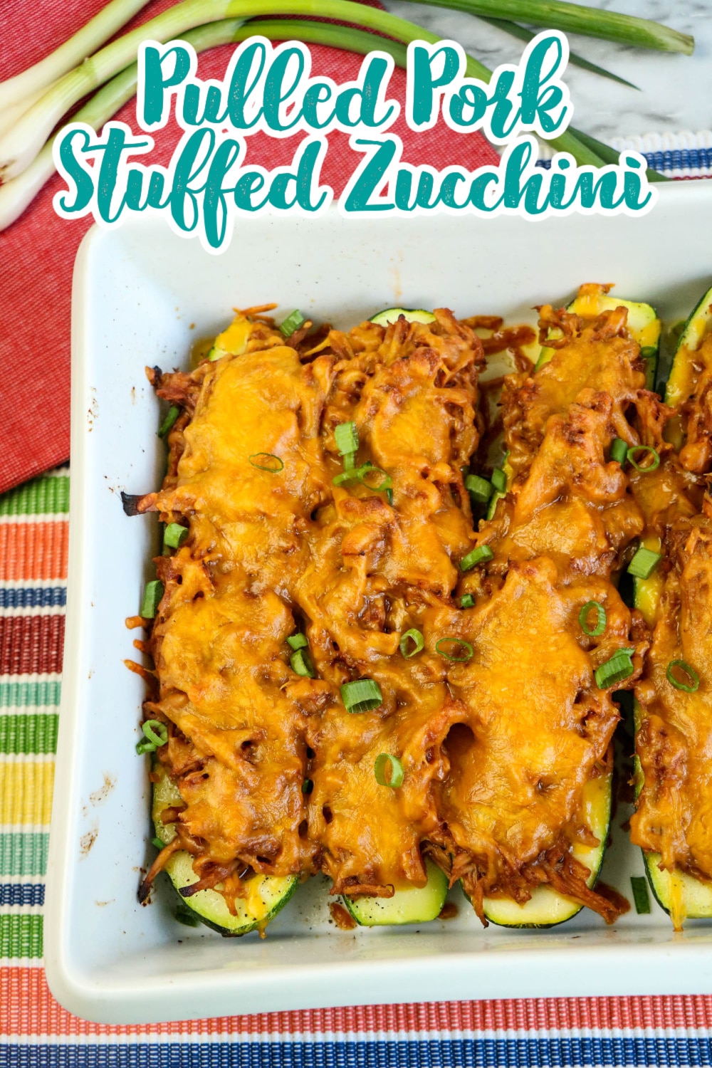 Pulled Pork Stuffed Zucchini in a baking dish.