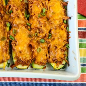 Pulled Pork Stuffed Zucchini in a casserole dish.
