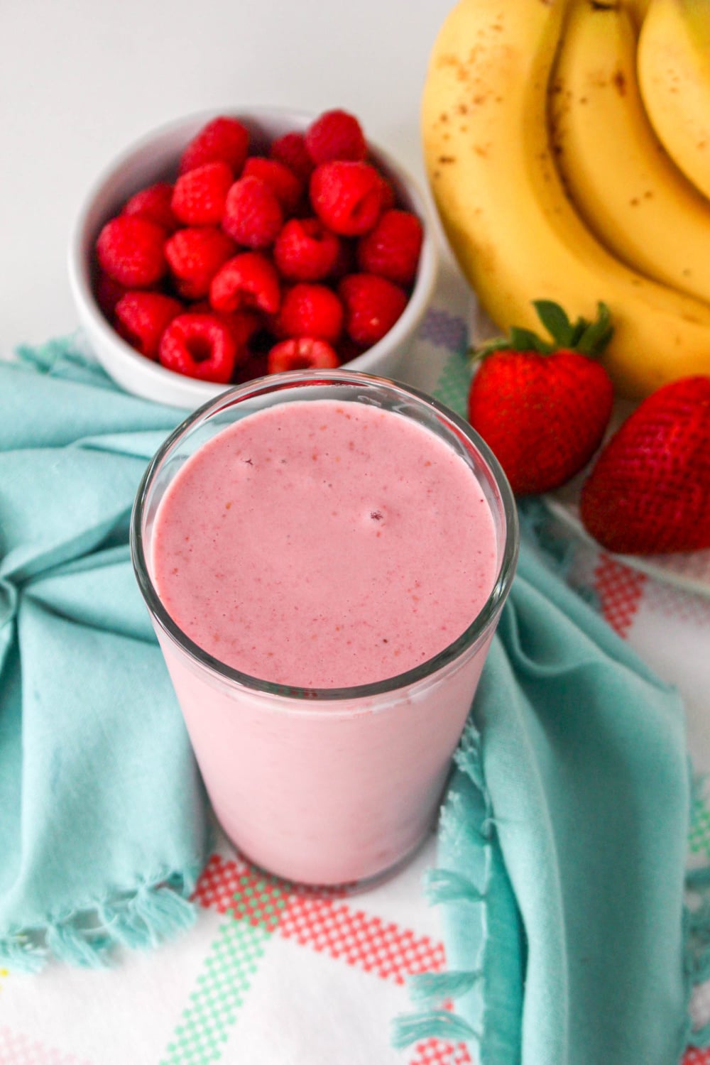 Raspberry Banana Smoothie in a tall glass.