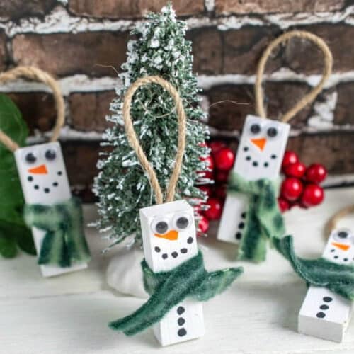 Wooden Snowman Ornaments with a bottlebrush tree.