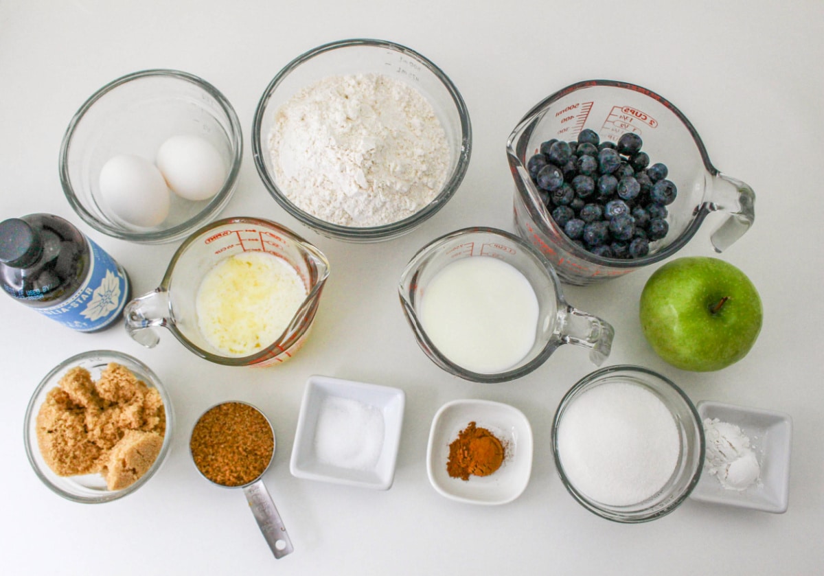 Measured ingredients for Blueberry Apple Muffins on a countertop.