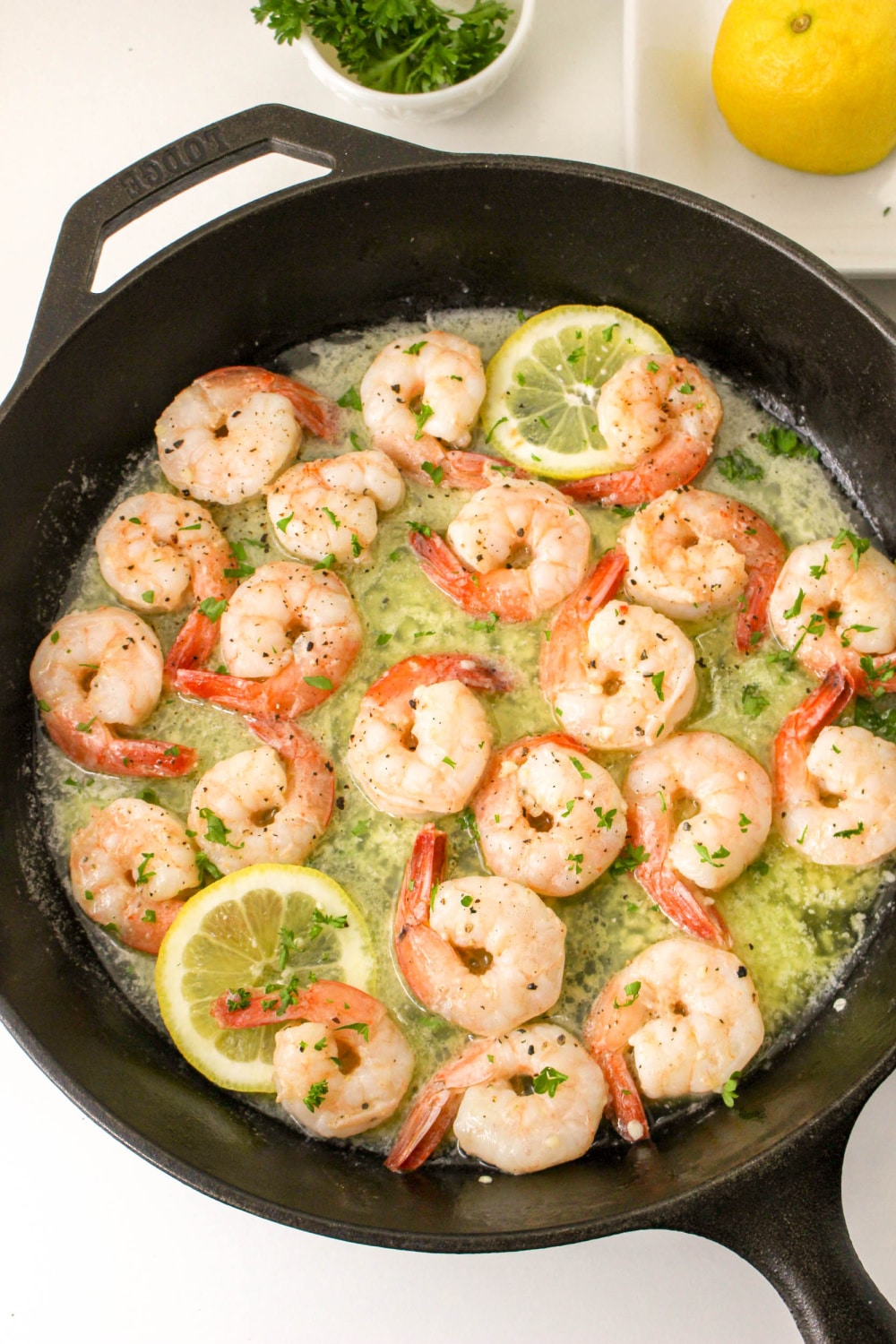 Garlic Butter Shrimp in a cast iron skillet.