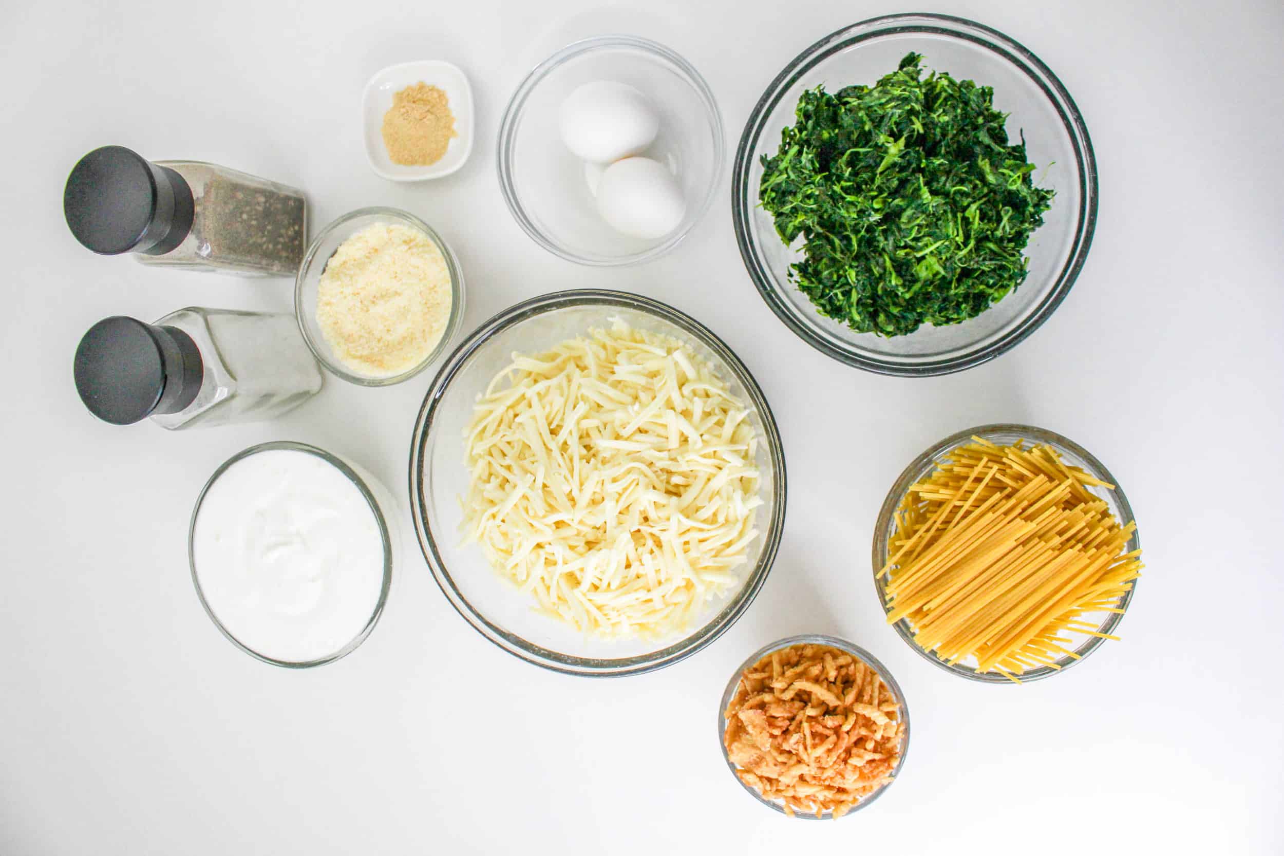 Monterey Spaghetti Ingredients on bowls on a counter top.