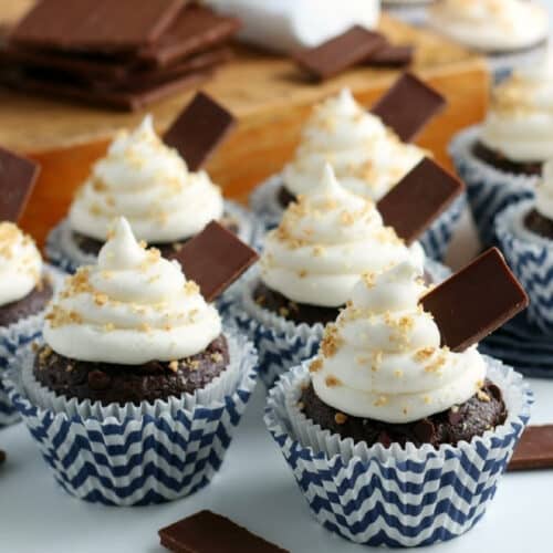 Chocolate cupcakes with graham cracker crust and mashmallow frosting.