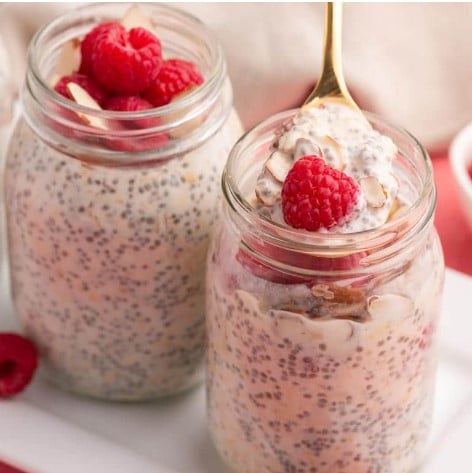 Raspberry Almond Overnight Oats in mason jars.