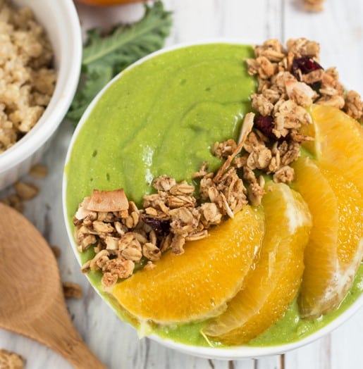 Orange Kale Quinoa Smoothie Bowl with granola.