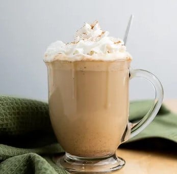 Pumpkin Spice Latte with whipped cream.