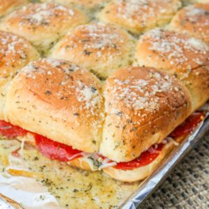 Pepperoni and Cheese Pizza Sliders on a baking tray.
