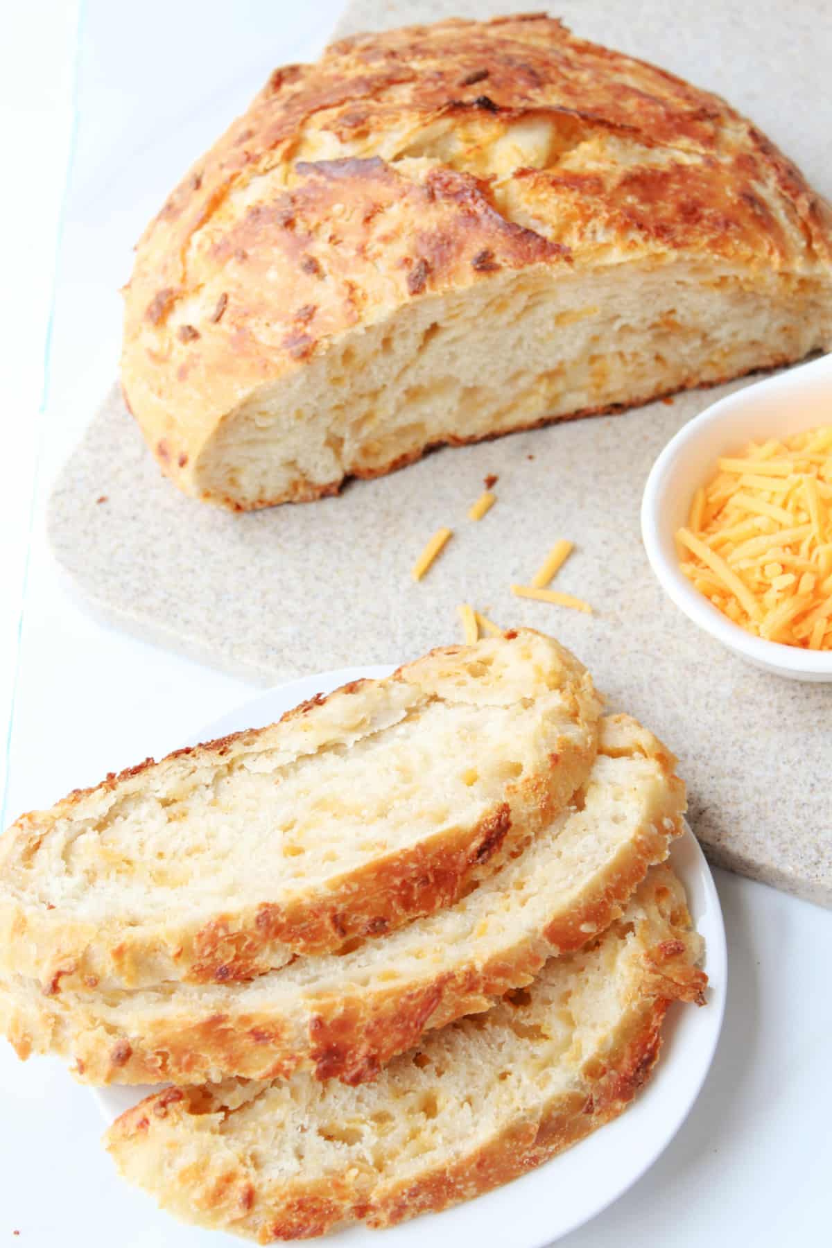 No Knead Dutch Oven Cheese Bread on a countertop.