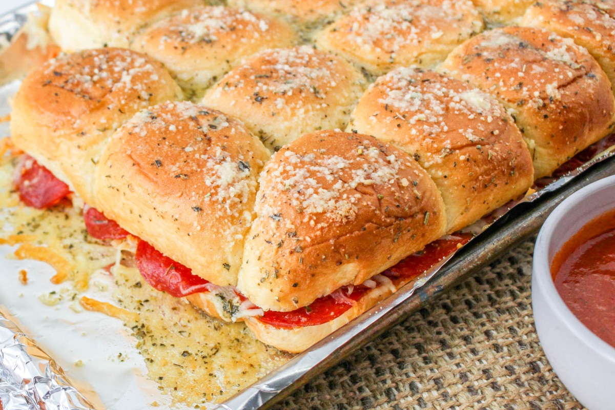 Pepperoni Pizza Sliders on a baking tray.